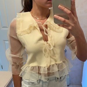 Sheer sleeve top